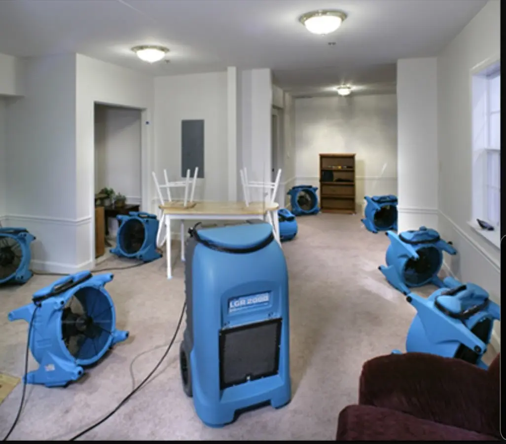 Air movers and dehumidifier setup for Water Damage Restoration in Iowa City